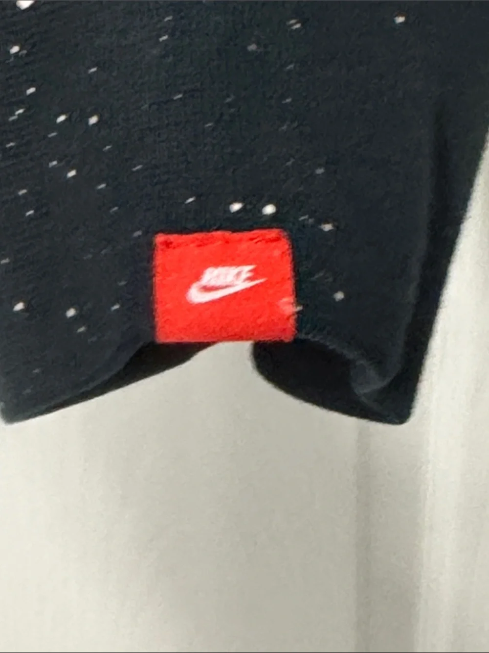 Nike Black Pullover Hoodie with White Swoosh and Paint Speckle